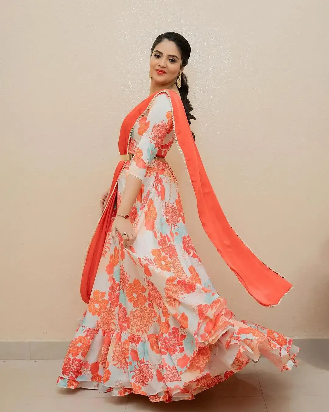 Beautiful Indian Actress Sreemukhi in Orange Lehenga Choli